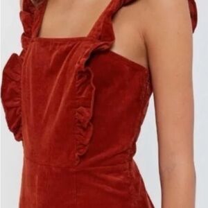 UO Red/Orange Corduroy Ruffle Jumpsuit